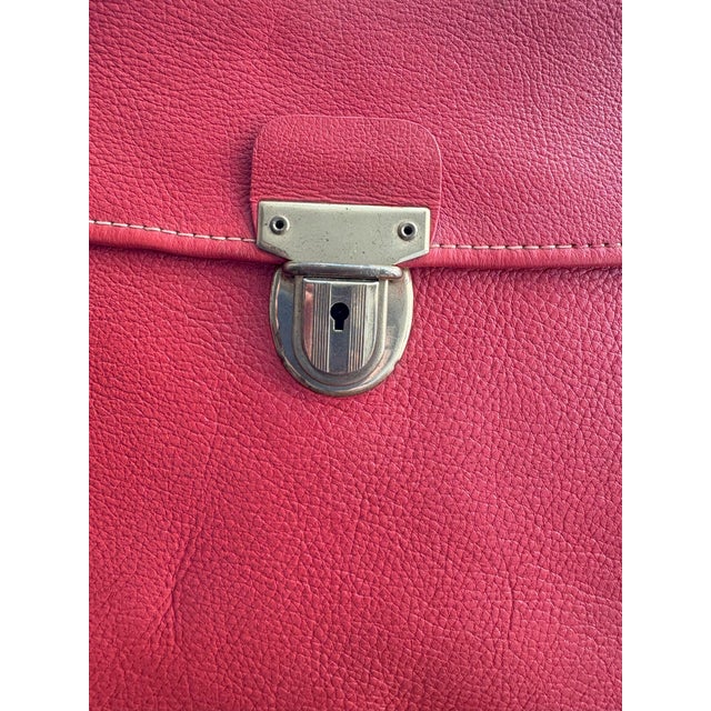 Rare vintage Bonnie Cashin Coach Portfolio Bag from the mid-1960s. Vibrant red leather with distinctive striped lining....