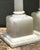 This pair of monumental table lamps captures the scholarly elegance of the Grand Tour era, expertly carved from solid...