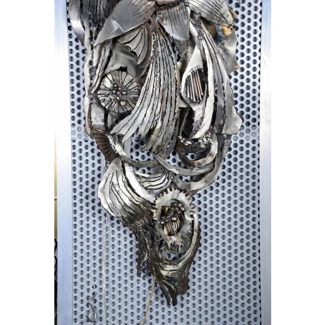 This brutalist wall light is made of iron with an inlaid amethyst and features the original invoice dated 13 June 1977. Up...