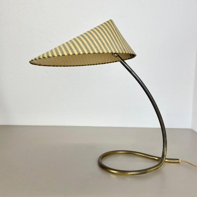 Table light origin: austria design and producer: attributed to j. T. Kalmar age: 1950s this original vintage table light...