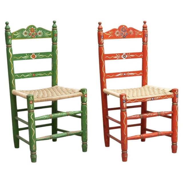 Set of two rustic handmade and handpainted wood chair. By unknown artisan in Spain, circa 1940. In good original...