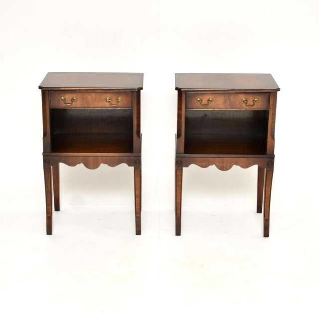 A smart and beautifully designed pair of antique Georgian style bedside cabinets / side tables. They were made in England,...