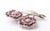 Hand-made 18kt white Gold Pin with two Flowers. Each set with 2 layers of Faceted Rubies and Diamond Petals with one Pave...