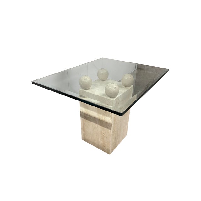 Fabulous, solid travertine base, topped with sculpted travertine spheres and thick glass. The beveled glass top has soft...