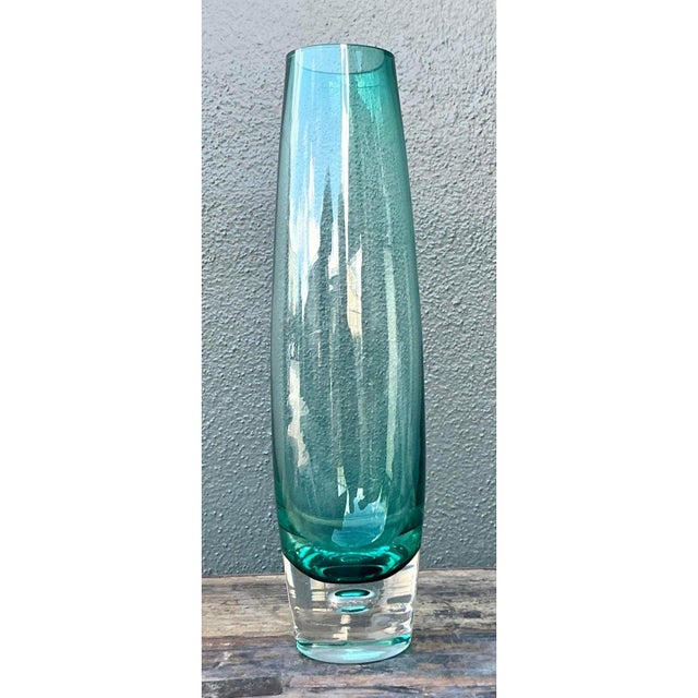 Immerse your space in the cool, crisp aesthetics of Scandinavian glass art with this striking vintage cylinder vase, a...