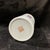 This cylindrical vessel, traditionally used by scholars to hold calligraphy brushes, is decorated in the classic Famille...