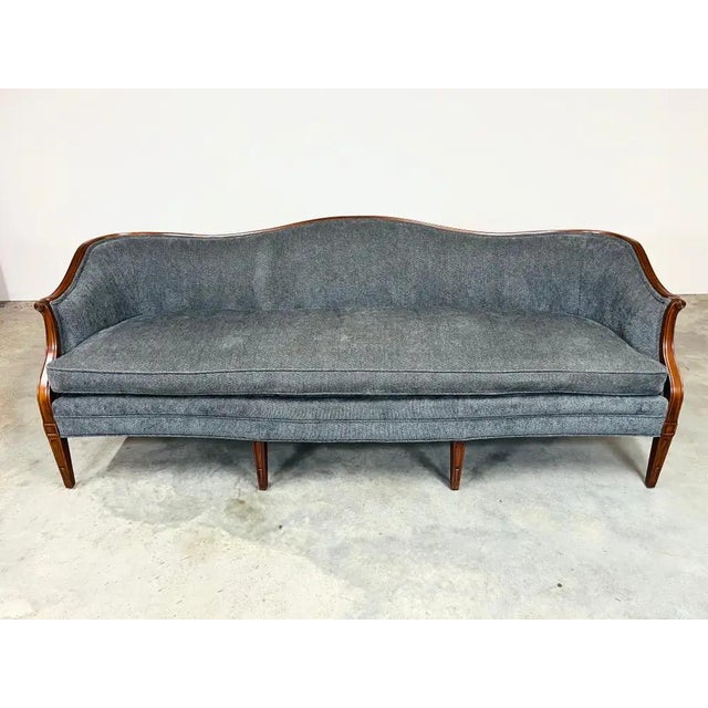 Classic Chippendale-inspired Serpentine Camelback design Sofa Attributed to Hickory Chair Company. Sofa is in a Deep Blue...