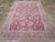 This early 20th-century Persian Tabriz accent carpet presents a richly detailed allover floral composition across a vivid...