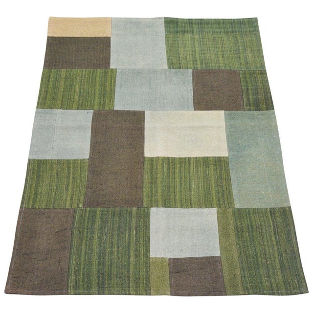 Flatweaved with care using traditional rug-making techniques, this wool rug blends timeless craftsmanship with a modern...