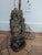 Antique Chinese lamp. Appears to be carved soapstone. Likely depicting the goddess Guanyin or an immortal. Greenish brown...