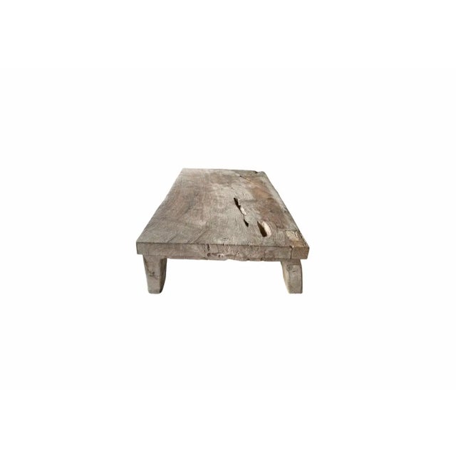This solid teak coffee table was crafted on the island of Madura off the Northeastern coast of Java, Indonesia. It...