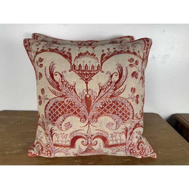 A striking pair of authentic Fortuny textile pillows featuring vintage Fortuny cotton fronts in the celebrated Mezzaro /...