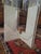 Dining table with glass top measuring 140 x 140 cm, from the 1970s, beautiful travertine base with insertion of red...