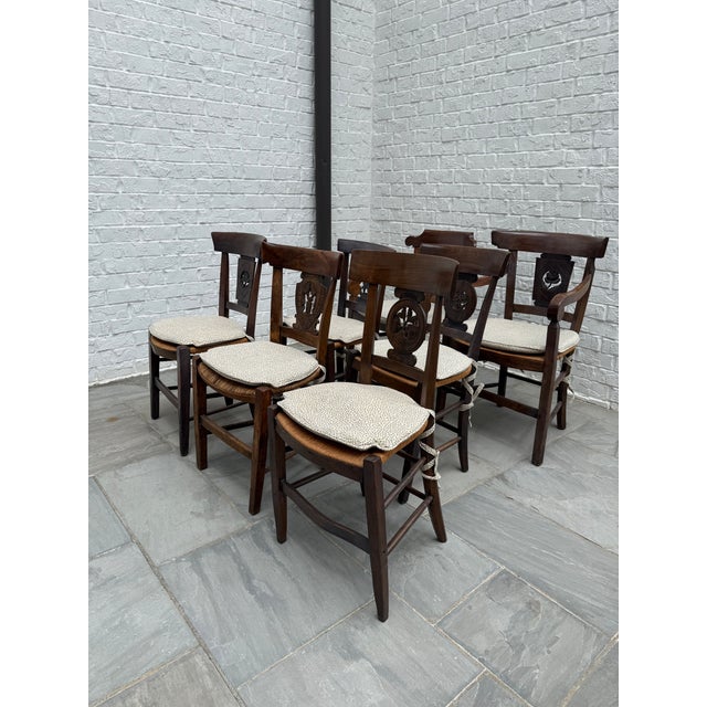 Set of 7 antique directoire chairs, including 2 armchairs and 5 side chairs. Originally purchased as a set in a New...