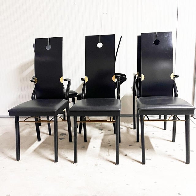 Extremely rare set of six sculptural chairs by Pierre Cardin, 1980s. Black lacquered wood frame, wing-shaped wooden...