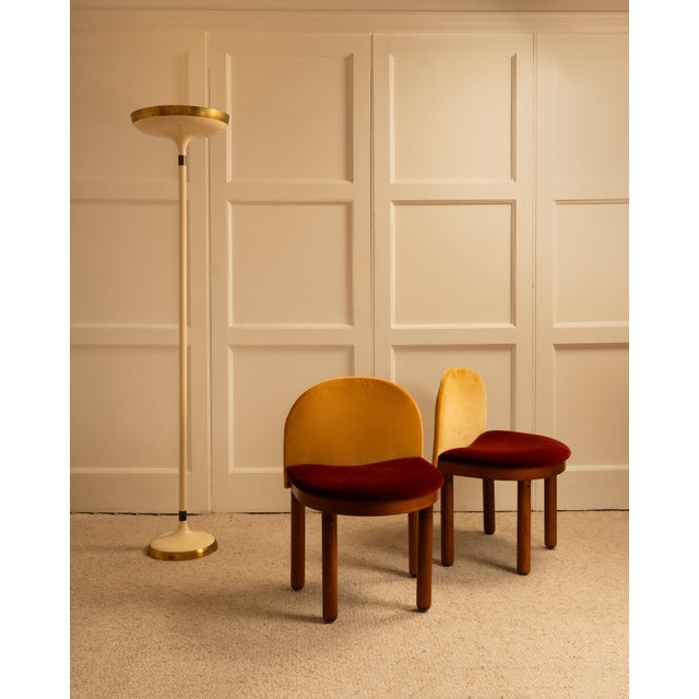 Pair of Italian chairs from the 1980s with rounded legs, upholstered in red and yellow velvet, showing some signs of wear....