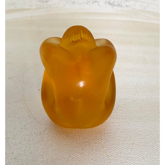 Classic elegance from Lalique France; Sitting crystal figure in rare yellow amber colored crystal with sanded finish...