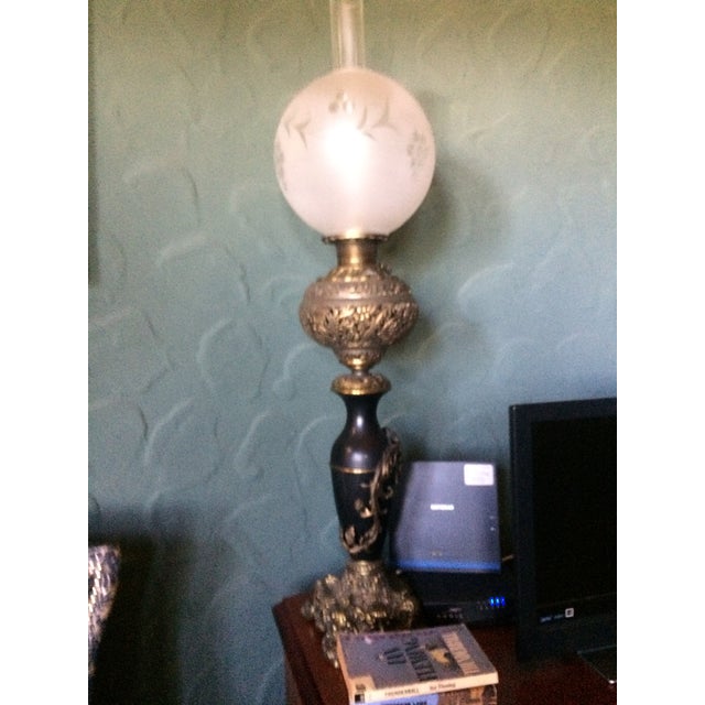 This lamp is a unique design French Victorian Electrified Oil Lamp With Etched Hand Blown Globe and Clear Chimney With...