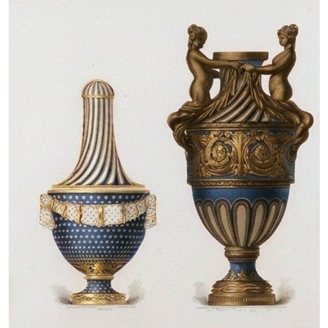 Blue and gold, printed with real metallic gold that genuinely gleams: a 19th-century chromolithograph of three exquisite...