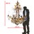 Large bronze chandelier with a gold patina, adorned with crystal drops (clear, smoky, and sometimes orange), and...