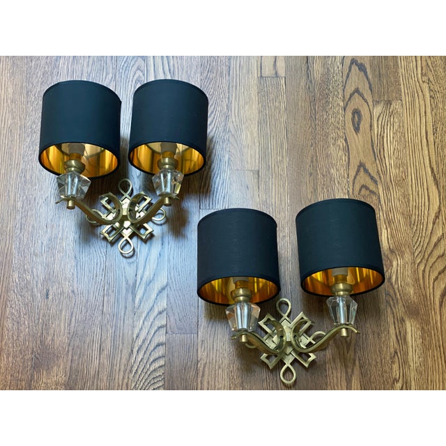 Jules Leleu polished brass and glass pair of sconces, attributed to Jules Leleu. Three pairs available. Professionally...