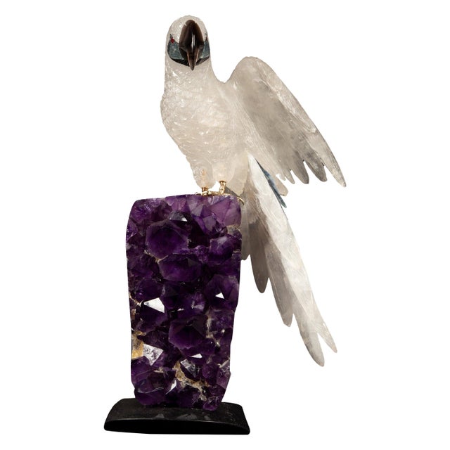 This exquisite 13-inch high carved rock crystal parrot, meticulously handcrafted in Argentina, presents a stunning...