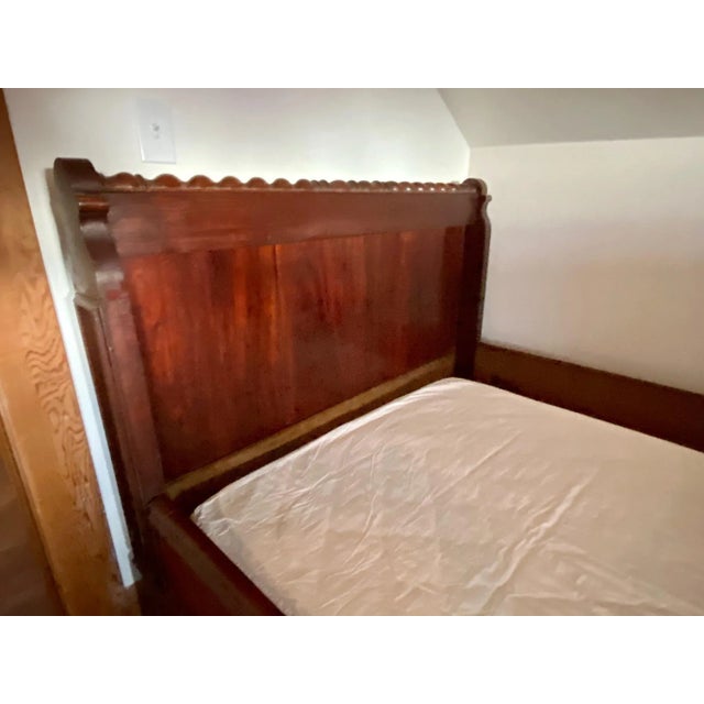 Antique carved alcove day bed, bedframe, 19th century, on wheels, some chips and missing trim. Approx 43.5"h, 86"L,...