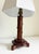 Exuding warmth and charm, this wood table lamp features a hexagonal column crafted from dark-stained walnut wood, subtly...