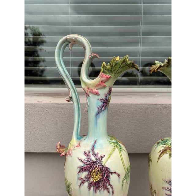 Large 19th Century Pair of Ewers Thistles Vases signed Delphin Massier. Height / 22 inches.