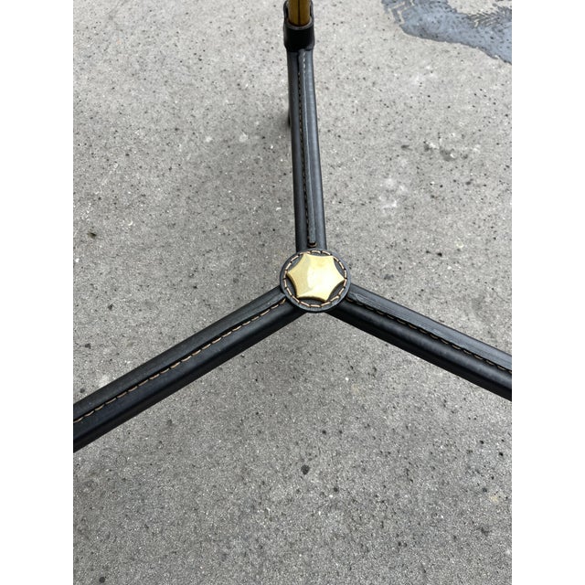 Rare leather-covered pedestal table by Jacques Adnet. I have official proof of authenticity such as vintage catalogs,...
