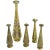 Group of five slender engraved brass flower vases dating to around 1900, probably Syrian or linked to the Damascus...