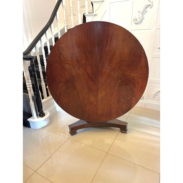 A fine antique Regency period circular mahogany centre table of elegant proportions and excellent colour. The top is...