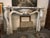 Elegant Italian marble fireplace dating from the early 20th century, executed in the refined Neoclassical style....