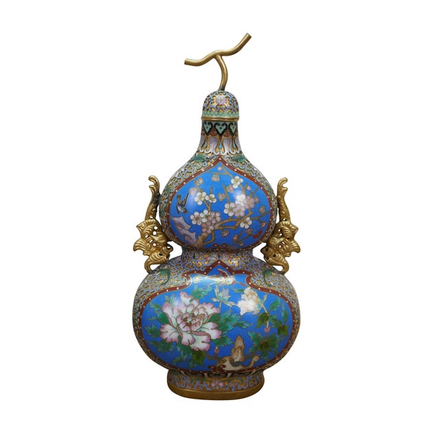 This matching pair of Chinese cloisonné enamel double-gourd (hulu) vases represents an exceptionally fine example of late...