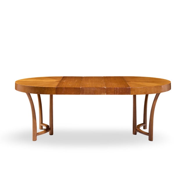 T.H. Robsjohn Gibbings for Widdicomb Mid Century Walnut Expanding Dining Table with 3 Leaves This table measures: 48 wide...
