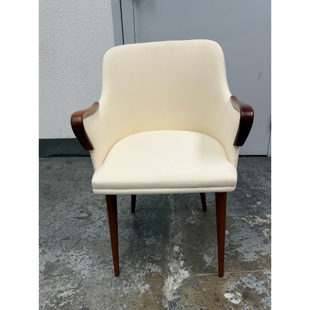 Design Plus Gallery presents a P38 Dining Arm Chair by Osvaldo Borsani. This is a fantastic of chairs in beech wood with a...