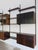 Scandinavian bookshelf in dark wood designed by Kai Kristiansen and manufactured by FM Mobler, consisting of 8 shelves of...