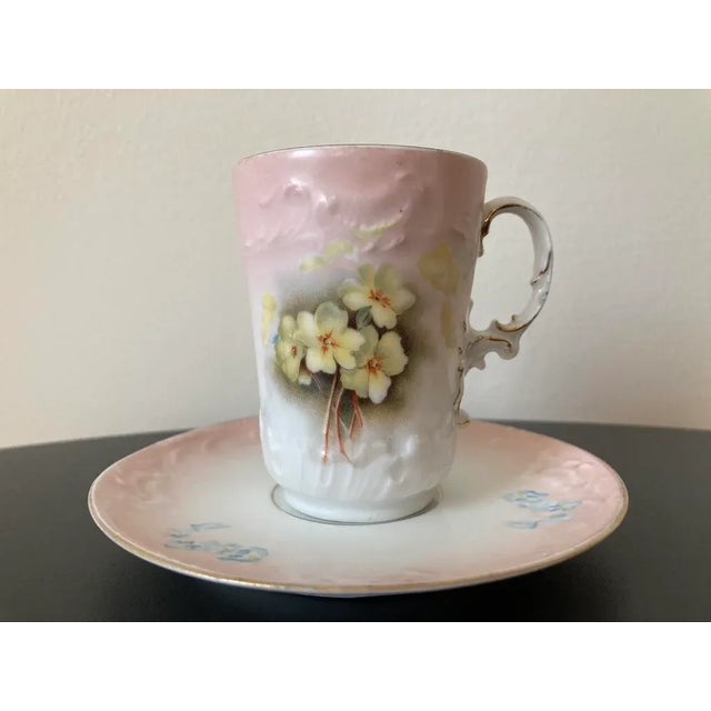 A very beautiful and rare antique Belle Epoque Austrian pink and floral porcelain coffee espresso tea cup and saucer made...