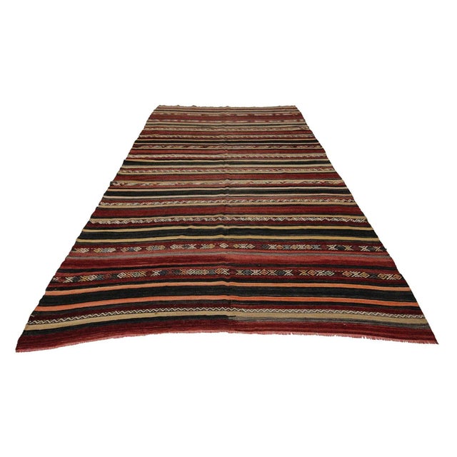 Vintage handwoven kilim rug from Denizli region of Turkey. Approximately 50-60 years old. In very good condition.