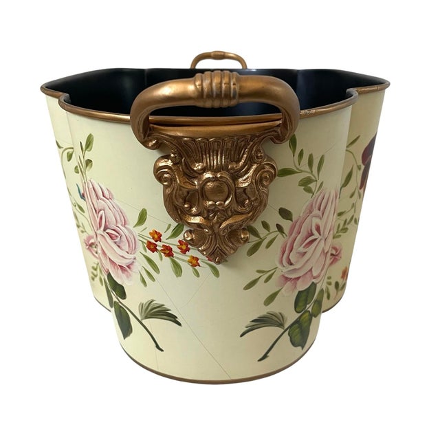 The Williamsburg Collection Quatrefoil Floral Oval Tole Planter Cachepot is a large 20-inch metal planter. Pattern:...