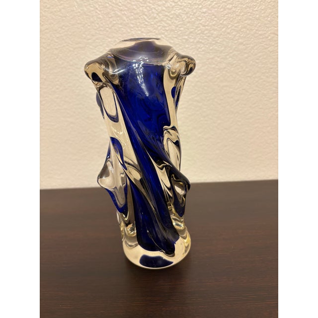 This piece of hand blown piece of Murano vintage glass, has the traditional caps of waves represented throughout the...