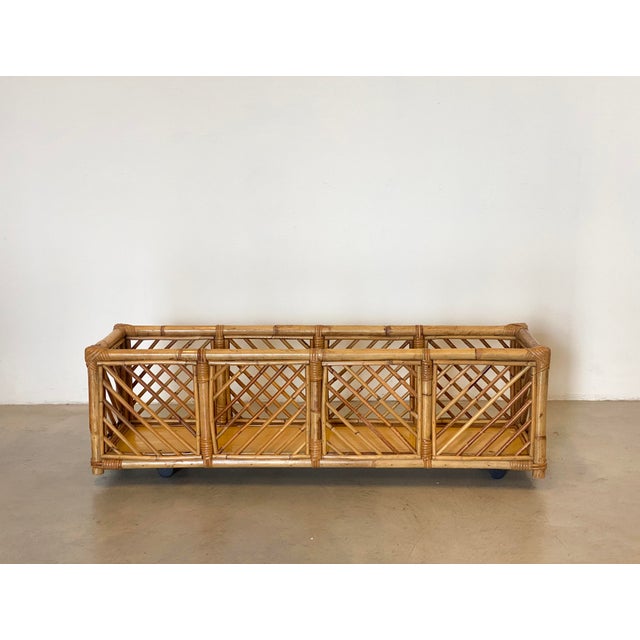 Rattan and bamboo pot holder with wheels from the 70s