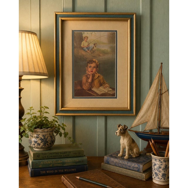 A charming vintage framed lithograph titled “Daydreams of Summer,” depicting a young schoolboy lost in thought as he...
