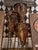 Set of three graduated sculptural metal floor vessels on twisted iron stands. The vessels feature tall conical forms with...