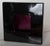 Made of pink and black glazed ceramic, it stands out for its striking geometric and architectural composition,...
