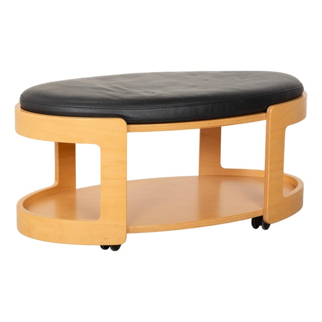 Wood and Black Leather Arion Ottoman with Wheels from Stressless For Sale