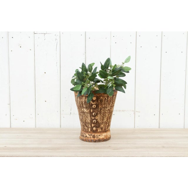 Beautiful Himachal water bucket with intricately hand-carved details with an iron handle and rope strap. This rustic...