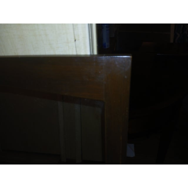Vintage Mid-Century Modern walnut dresser wall mirror, curved, architectural upper edge and crisp side profile—closely...