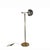 Mid-century adjustable floor lamp attributed to Leuchten, Germany. Solid brass construction with a slender upright and...