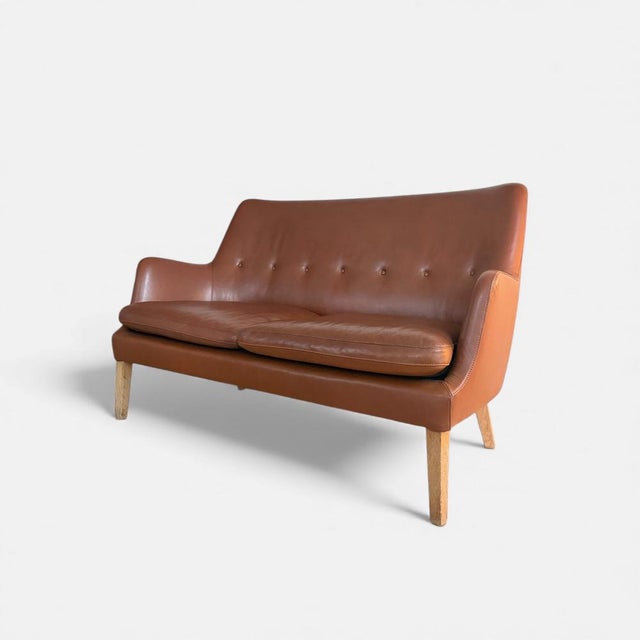 Vintage Arne Vodder Two-Seater Lounge Sofa in Cognac Leather – Danish Modern Stunning two-seater sofa designed by the...